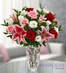 When white roses are mixed with pink roses, the meaning changes to enduring love. Marquis By Waterford Red Rose And Lily Bouquet Arranged By A Florist In Ny 1800flowers Massapequa