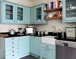 Aqua shutters, clock, and appliances can add just the right kind of accent color to your white kitchen. Pretty Aqua Kitchen Turquoise Kitchen Cabinets Kitchen Design Decor Aqua Kitchen