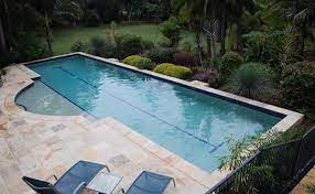 60' contemporary lap pool set in woodland setting with ledge outcrops and ornamental bamboo plantings. 15 Fascinating Lap Pool Designs Home Design Lover
