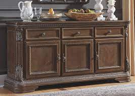 There are countless options for dining room storage. Charmond Dining Room Buffet Ashley Furniture Homestore Independently Owned And Operated By Hamad M Al Rugaib Sons Trading Co