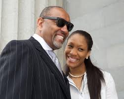 Wilson's father also adjusting to the WNBA