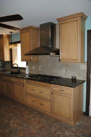 What color countertops go with dark maple cabinets? Duraceramic Floors Maple Cabinets Baltic Brown Granite With Tile Backsplash American Traditional Kitchen Other By Hatchett Design Remodel Houzz