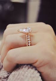 Handcrafted In Romantic Rose Gold This Stunning Pear Shaped Halo Engageme Engagement Ring Shapes Pear Shaped Engagement Rings Pear Shaped Halo Engagement Ring