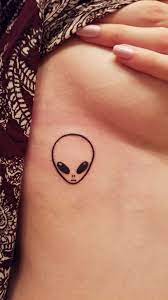 The main attraction of this tattoo is the beautiful work of the artist to portray the floral design. Alien Tattoo In 2021 Alien Tattoo Tattoos Cool Tattoos