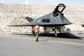 We've still got some work for you, too, so don't slack off now. A Ground Crewman Communicates With The Pilot Of An F 117a Stealth Fighter Aircraft Of The 37th Tactical Fighter Wing Prior To The Flight Back Home After Operation Desert Storm U S National