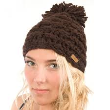 If you're a beginner, knitting a hat is a good way to learn a few new skills in a manageable way. Delux Brown Pom Pom Scandanavian Toque Winter Hat Sunshine On A Cloudy Day