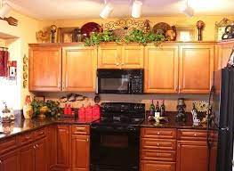 We're also a popular pick for holiday and seasonal kitchen accents, with options for christmas, thanksgiving and more. Wine Kitchen Themes Google Search Decorating Above Kitchen Cabinets Cabinet Decor Kitchen Cabinets Decor