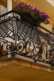 Also, you can throw in some soil by the bottom of the fence, outline it with stones and use it as. Railings On The Balcony 35 Photos Wooden Fencing On The Loggia Of Metal Wood