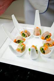 Amuse Bouches Of Hamachi Rolled In Lettuce With Mint Thai Basil Carrot And Lime Nage By Eric Ripert Food Appetizer Recipes Appetizer Snacks