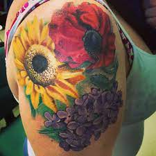 Poppy Sunflower And Lilac Tattoo Lilac Tattoo Sunflower Tattoo Shoulder Daffodil Tattoo