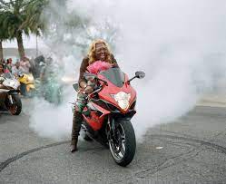 Stunning Photos Of Caramel Curves The All Female Motorcycle Club That Rules The Streets Of New Orleans Motorcycle Women Motorcycle Clubs Motorcycle Girl