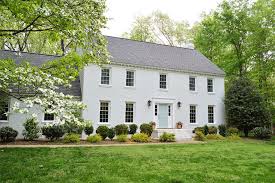 Painted the brick white, built new shutters and added landscaping and roof. Painting Exterior Brick Considerations When Painting Brickwork