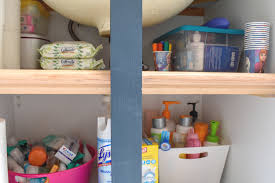 How to easily double the storage capacity under your sink for cheap last week, i showed you how i transformed the look of this kid's bathroom in just 8 hours. Bathroom Organizing Diy Under Cabinet Bathroom Storage T Moore Home Interior Design Studio