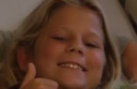 Ten-year-old gets bitten by shark. Goes back in water to save friend