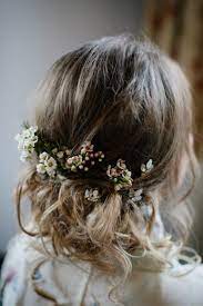 Loose And Rustic Boho Wedding Hair For A Bohemian Bride Some Small Wild Flowers In The Messy Waves Of Bohemian Wedding Hair Boho Wedding Hair Flowers In Hair