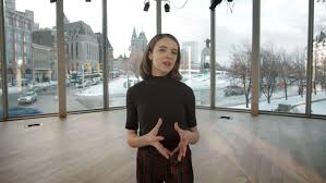 Puis on se rapproche de la porte où une affiche à l'entrée indique : Pourquoi Les Francophones Du Canada Se Connaissent Ils Si Peu Rad