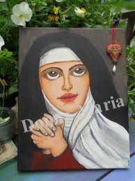 I don't know if this is worthy of posting but, this is one of the statues I  painted of St. Teresa of Avila. It is in the chapel of the Monastery of
