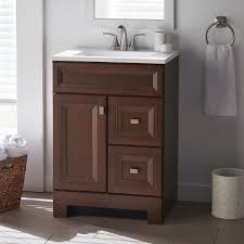 Home Decorators Collection Sedgewood 24 1 2 In W Bath Vanity In Dark Cognac With Solid Surface Technology Vanity Top In Arctic With White Sink Pplnkdcg24d Th In 2020 Vanity White Sink Bath Vanities