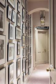 Hallway ideas diy picture frame decor hallway wall decor hallway walls hallway lighting foyer decorating decor upstairs hallway hanging frames. Display Photos Hallway Ideas Decor Accessories House Garden