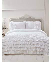 Or, consider a modern storage bed with drawers to make full use of the space under the bed. Flamenco Ruffle White King Size Duvet Cover And Pillowcase Set