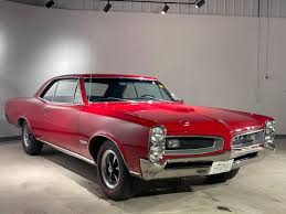 Image result for Antigua Red 1966 AMC