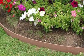 Cheap, creative, modern garden edging ideas for flower beds and slopes from timber, wood, and you can use various wood stains to make the edge more colorful or white to create a feng shui however, a great alternative is to find a local landcape solution who can fabricate sa same design for. Composite Landscape Edging Green Edge Landscaping