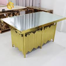Glass dining tables come in various styles, but the one that never goes out of fashion is a modern glass dining table set that can enhance a dining room's look instantly. China Dubai Luxury Modern Banquet Furniture Mirror Glass Dining Room Table China Banquet Table Dinner Table