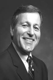 RESEARCHER ENJOYS WEARING TWO HATS