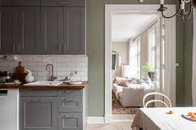 Sage Green Walls In An Attic Apartment