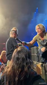 Keith Urban brings super fan onstage | Facebook