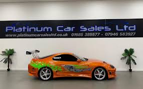 The late actor's orange car is one of 58 stunt cars fitted with a full roll cage also see: Fast Furious Paul Walker Toyota Supra Mk4 Replica