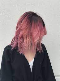 When using pink highlights in brown hair or black hair, you can achieve a more moody style by going with a deeper shade. Dark Roots Pink Hair Pink Hair Dye Dark Pink Hair Hair Styles