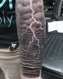 At tattoounlocked.com find thousands of tattoos lightning tattoo with dark clouds : Meanings Behind Lightning Tattoos Custom Tattoo Design