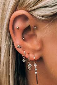 Explore The Most Popular Types Of Ear Piercings From Ear Piercings Minimalist To Multiple Ear Piercings Types Of Ear Piercings Earings Piercings Ear Piercings