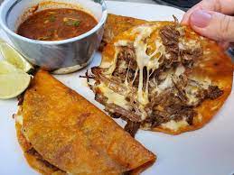 Flip, with the cheese, and fill with beef. Beef Birria Quesa Tacos With Consomme La Saucy Kitchen