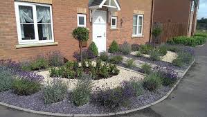 Lavenders And Slate For Formal Small Front Garden With Bay Tree Centre And Cobble Path Small Front Gardens Slate Garden Front Garden