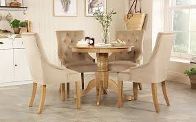 Many country kitchens have oak cabinetry making oak a great choice for dining room furniture. Kingston Round Oak Dining Table With 4 Duke Mink Velvet Chairs Furniture And Choice