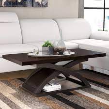Knot holes, cracks and distressing can be expected and are a part of what adds character to this timeless pieces. Wade Logan Annica Cross Legs Coffee Table With Storage Reviews Wayfair Ca