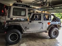 Thus, many choose to do the lift themselves quite simply at home. Hands On Garagesmart S My Jeep Top Lifter Garagespot