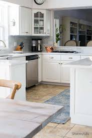 It honestly took me a long time to decide on the right tile. Carrara Marble Tile Backsplash Kitchen Reveal Shabbyfufu Com