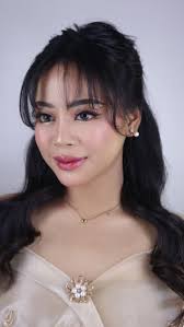 Glowing for her grad shoot , MUA