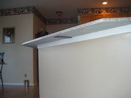 When the installer came out to measure the template, he didn't mention anything about support brackets for the overhang. Granite Countertop Bar Tops Island Overhangs Countertops Countertop Brackets Granite Countertops