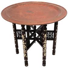 The legs are fancily turned with a carved all over design and shell inserts. Folding Tray Tables 78 For Sale On 1stdibs