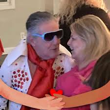 Who is the person in the Smothering of the Tribes Reunion photo?