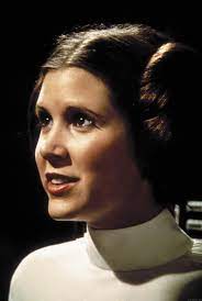 A Look Back At Carrie Fisher As Princess Leia In Star Wars Leia Star Wars Star Wars Episode Iv Star Wars Movie