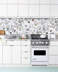 Apply A Mirrored Backsplash Kitchen Wallpaper White Kitchen Appliances Wallpaper Backsplash Kitchen