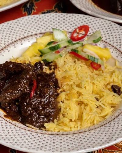 Nasi dalca Malay rice dish with curry and vegetables