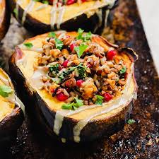 Wild Rice And Tempeh Stuffed Acorn Squash Emilie Eats Recipe Acorn Squash Vegan Dinners Appetizer Ingredients