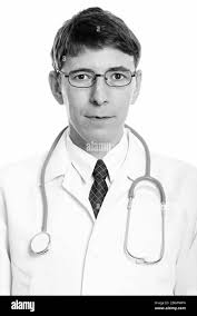 Man glasses looking at camera Black and White Stock Photos & Images