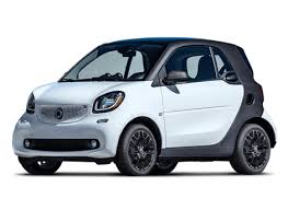 For 2013, the diminutive smart fortwo features restyled front and rear fascias and door sills, with a larger badge on the grille. Smart Fortwo Consumer Reports